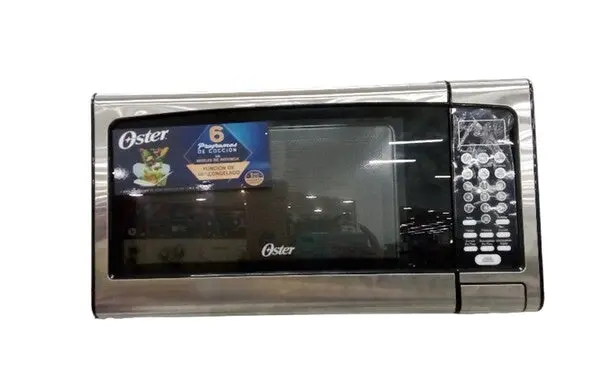 Oster Ogj041010 Black Countertop Microwave Oven 1